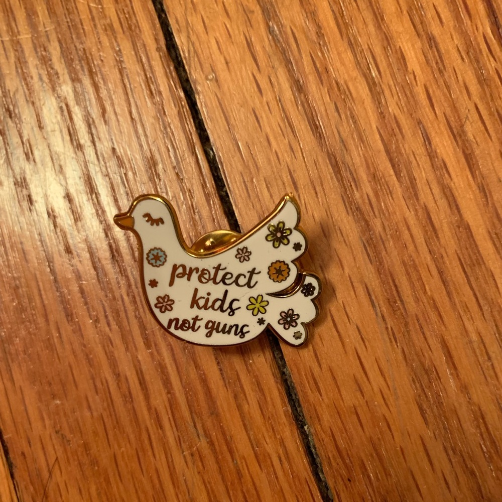 “protect kids not guns” pin